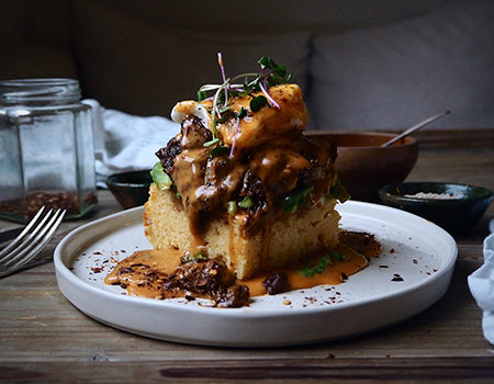 Slow Cooked Pork Eggs Benedict with Chipotle Hollandaise and Cornbread