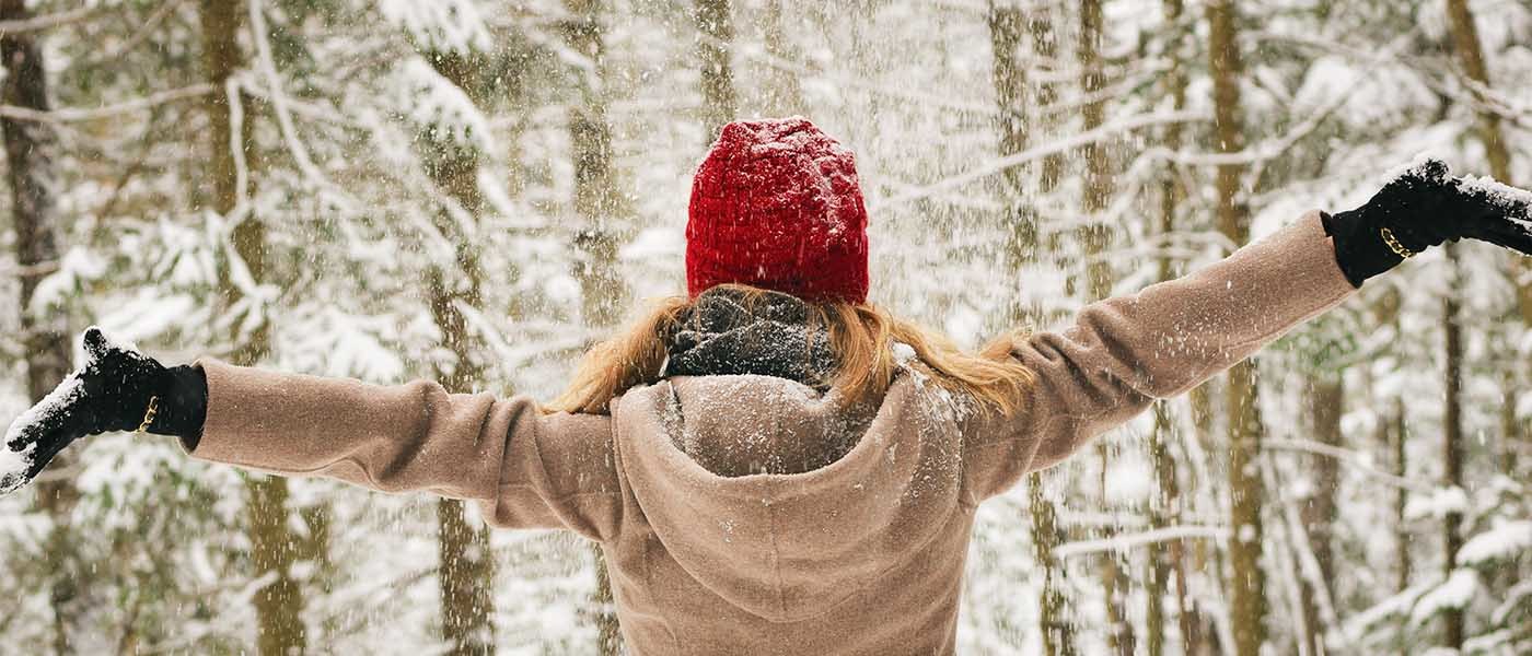 Woman Jumping in the Snow